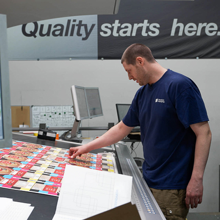 Management Training Program student Tyler Ryder working in the Sonderen Packaging facility. 