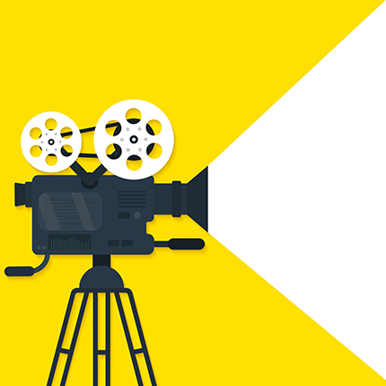 An illustration of a movie camera. It's surrounded by a yellow background but is shooting a white light.