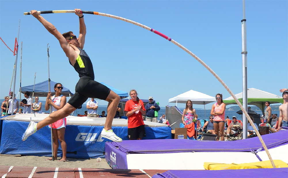 Pole vaulter in mid air